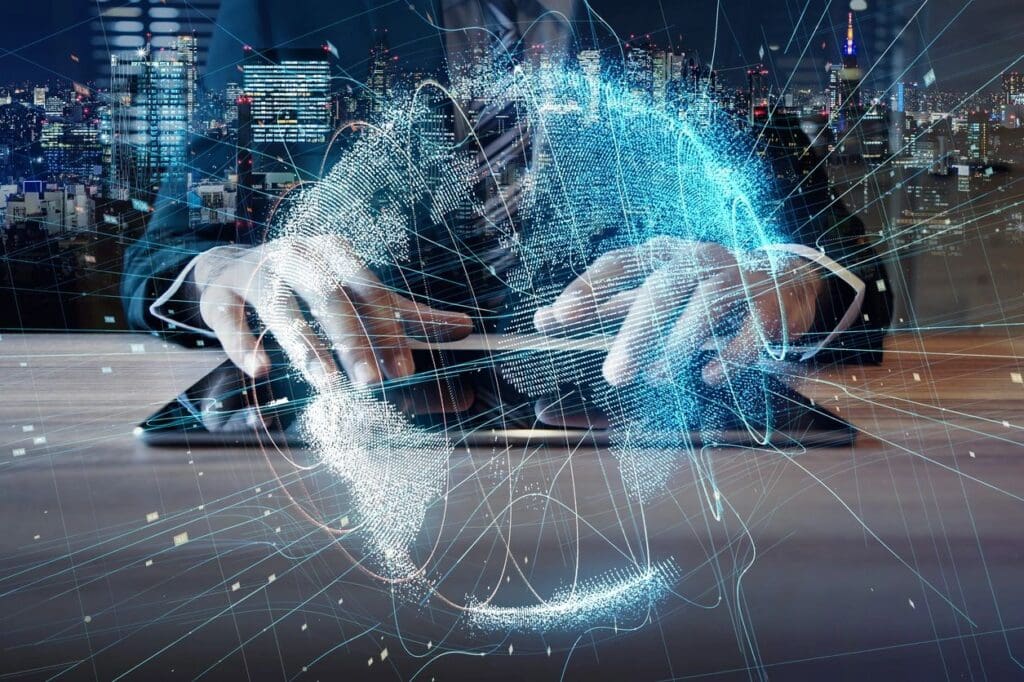 Businessperson using tablet with holographic global network