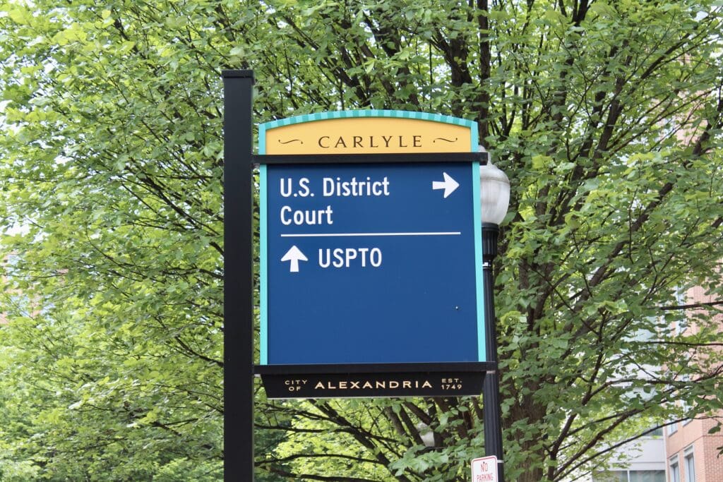 Blue sign directing to U.S. District Court